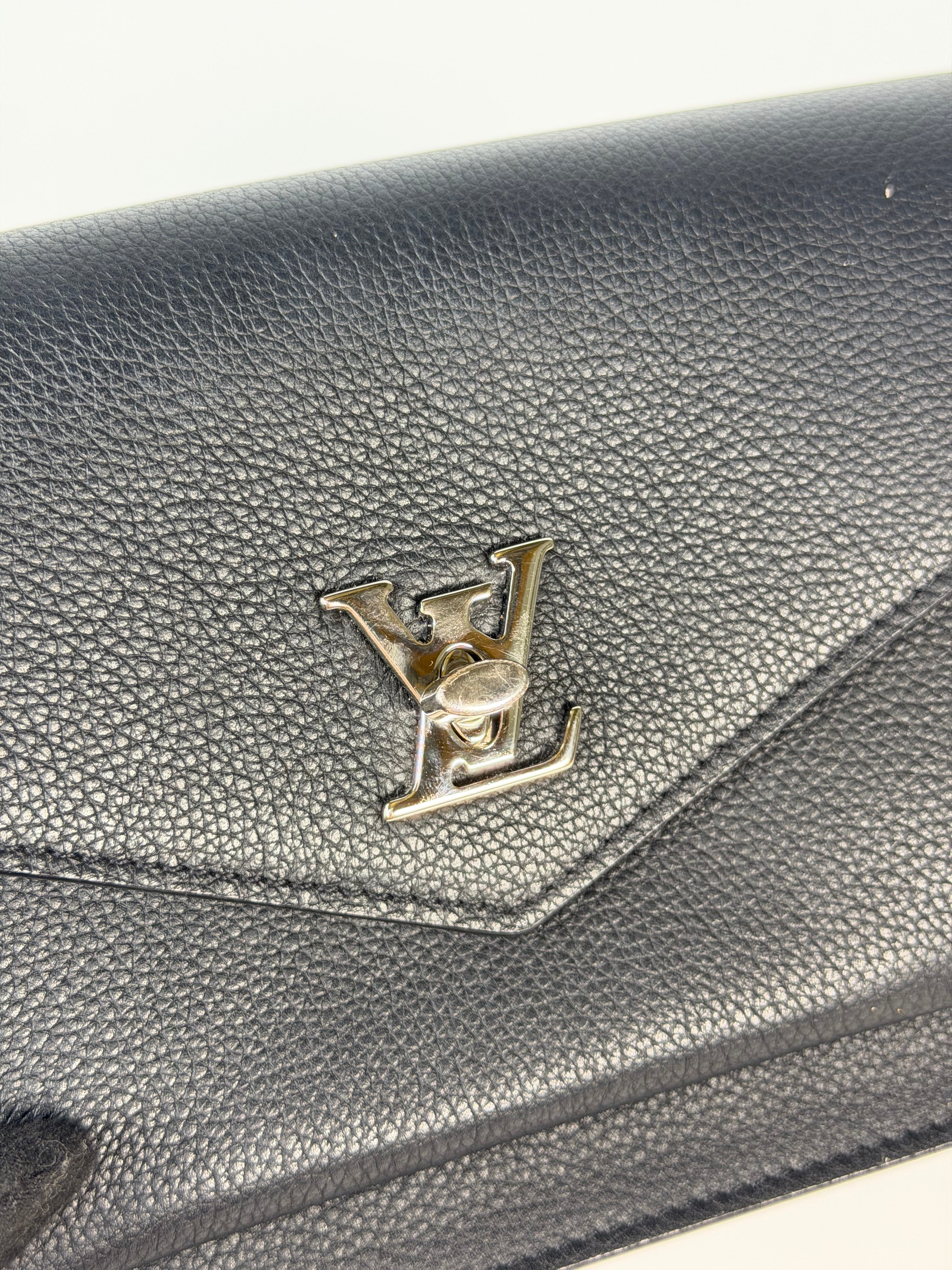 Louis Vuitton Pochette Chain MyLockMe In Black Leather With Silver Hardware in excellent condition 100% authentic and preloved 