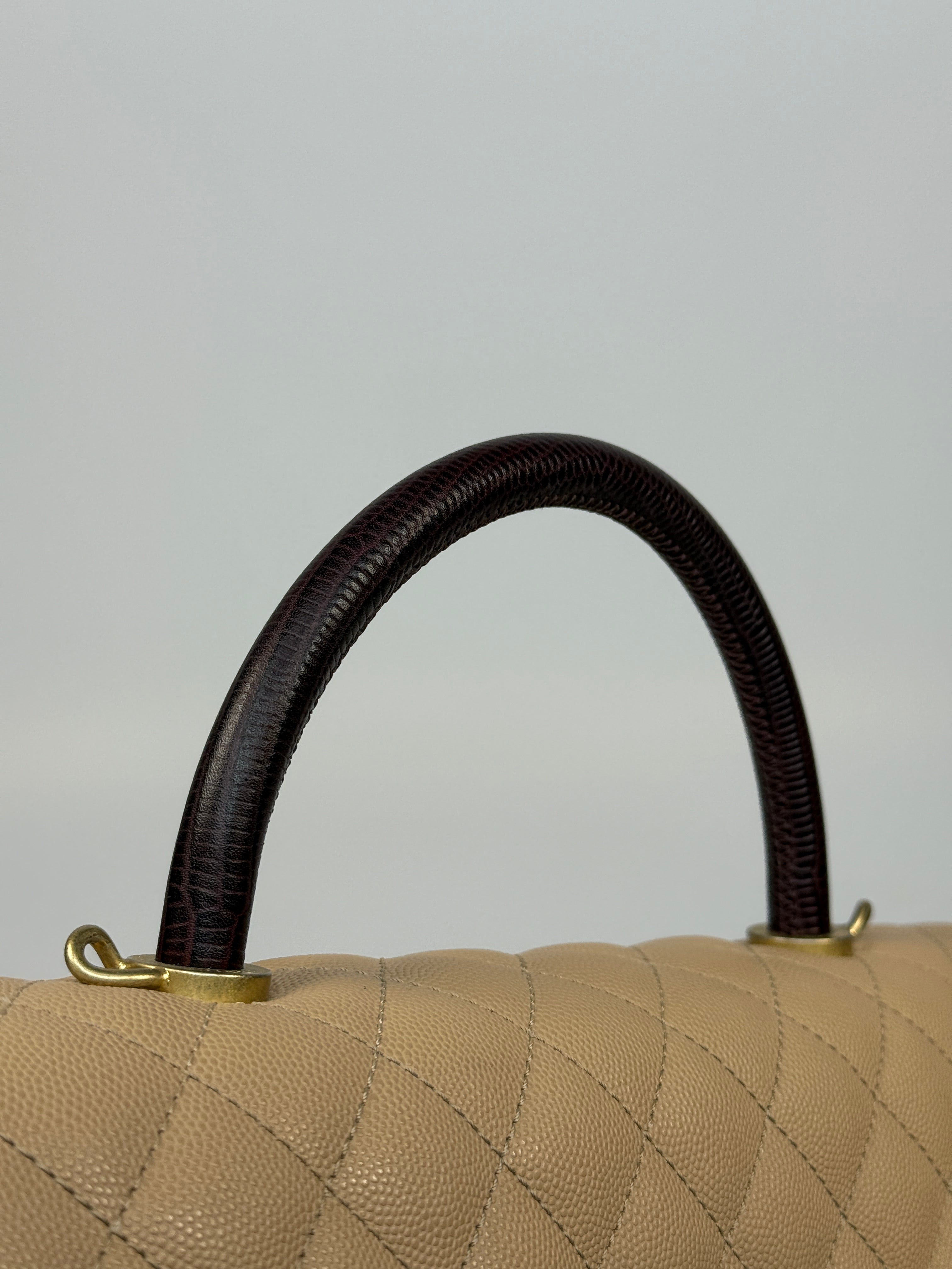 Chanel Coco Large Top Handle In Beige Caviar Leathe With Gold Hardware
Pre Loved & Authentic 