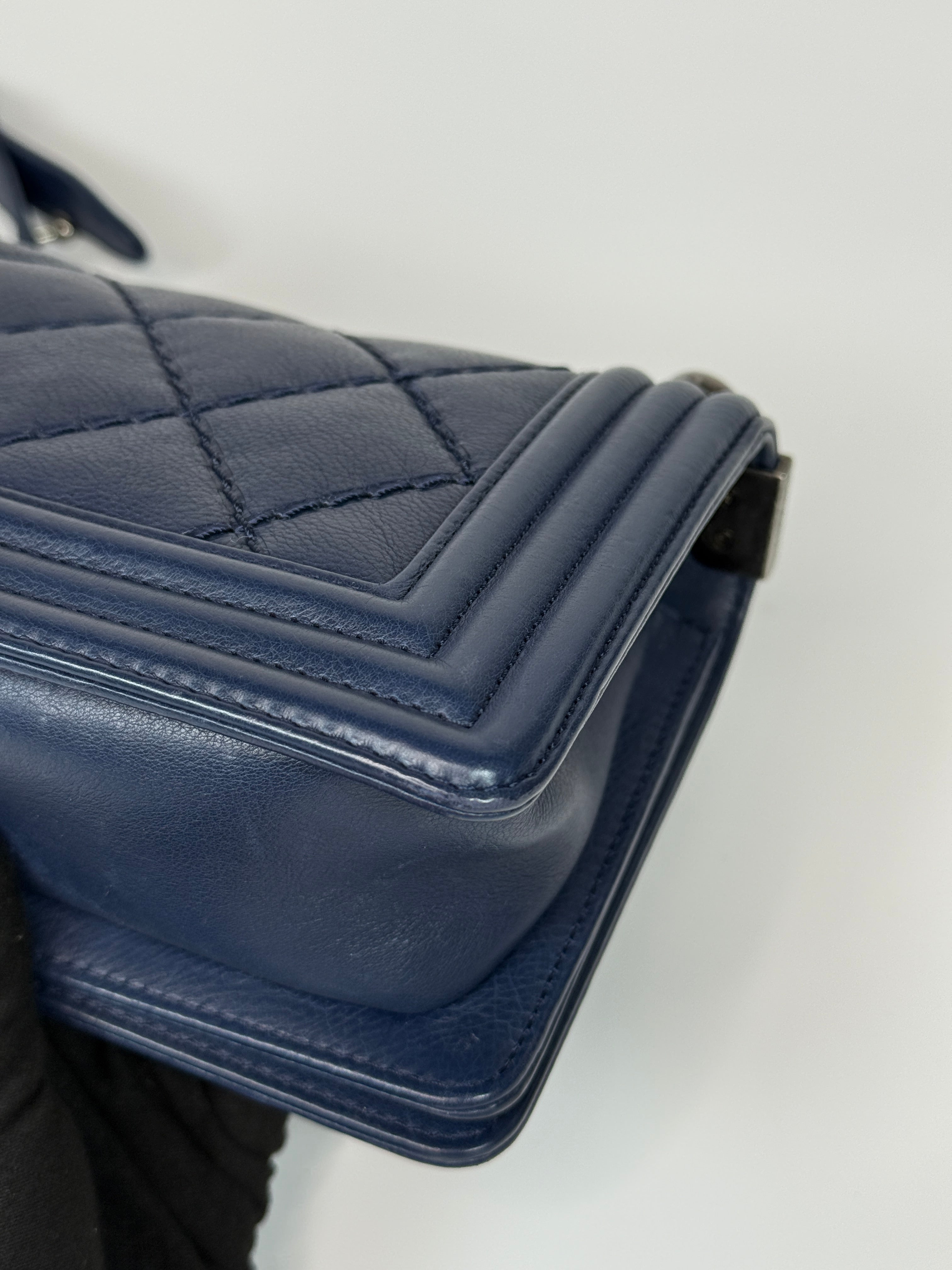 Chanel Mini Boy Bag In Navy Lambskin With Ruthenium Hardware In Excellent Condition.
Authentic Pre Loved Verified by Luxe Cheshire Trusted Designer resale 
