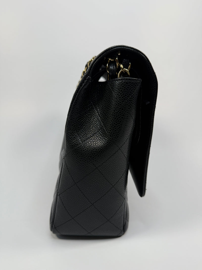 Chanel Maxi Classic Double Flap In Black Caviar Leather With GHW