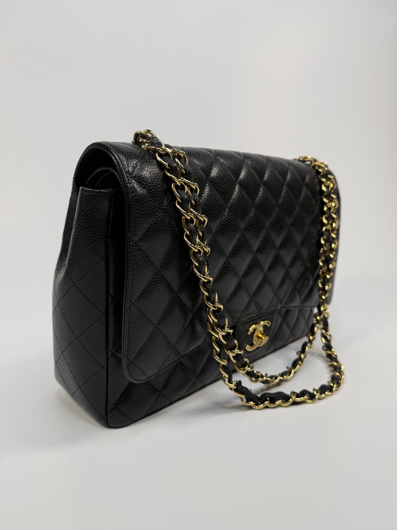 Chanel Maxi Classic Double Flap In Black Caviar Leather With GHW