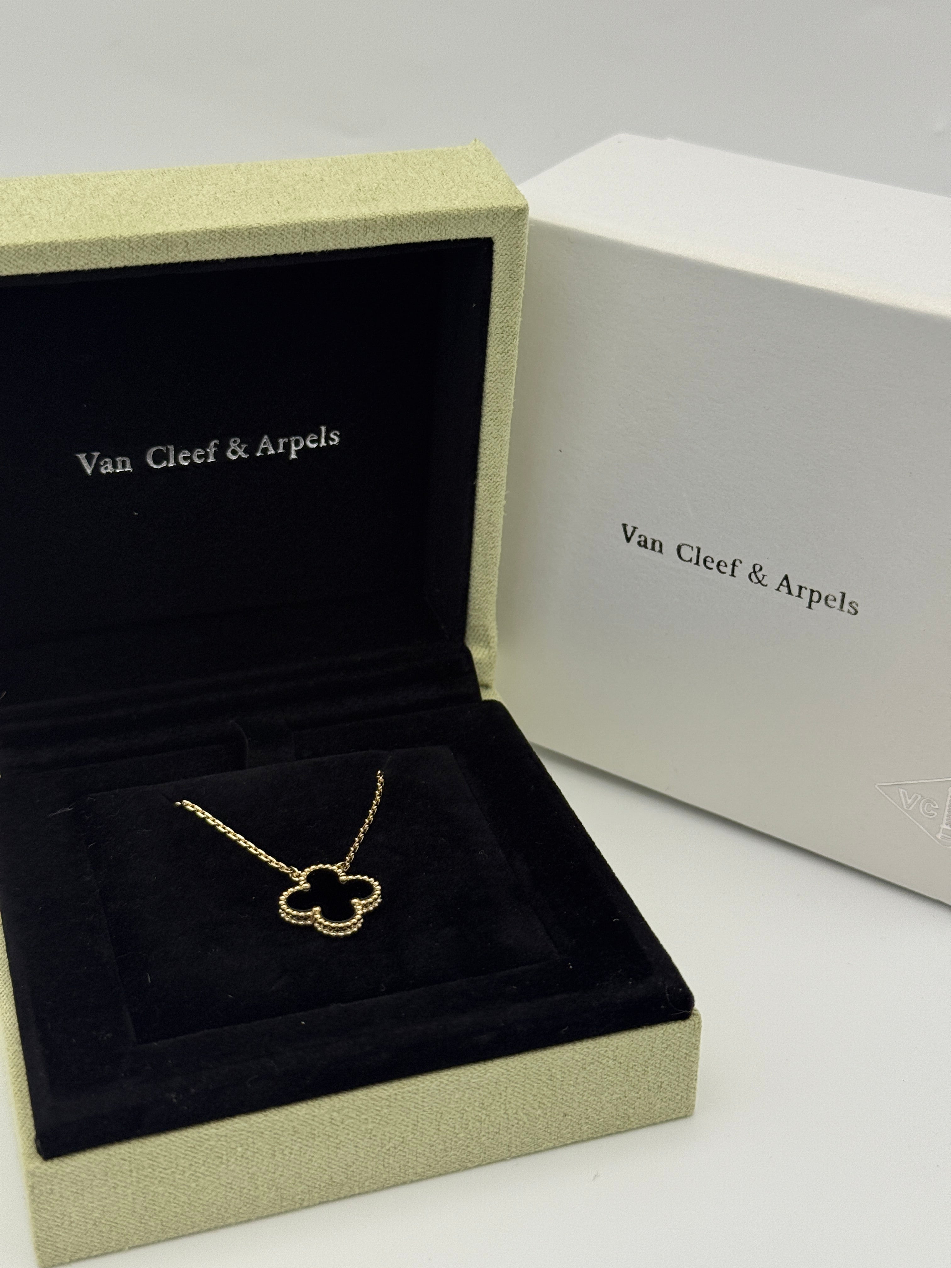 Van Cleef & Arpels Vintage Alhambra Onyx Pendant authentic and preloved in excellent condition.