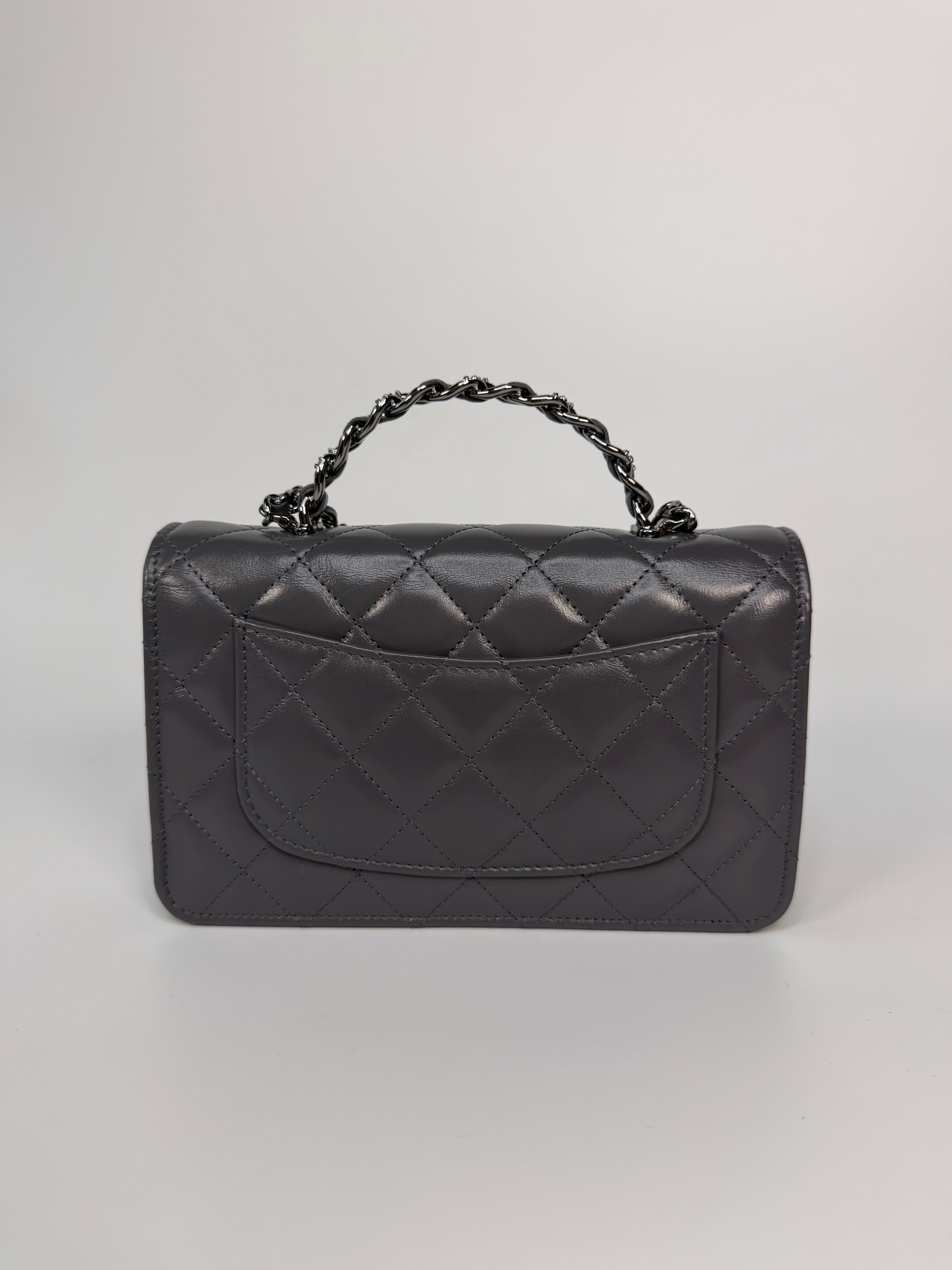 Chanel Wallet On Chain Top Handle In Grey Lambskin With Ruthenium Hardware. Authentic and preloved in excellent condition. 100% guarantee