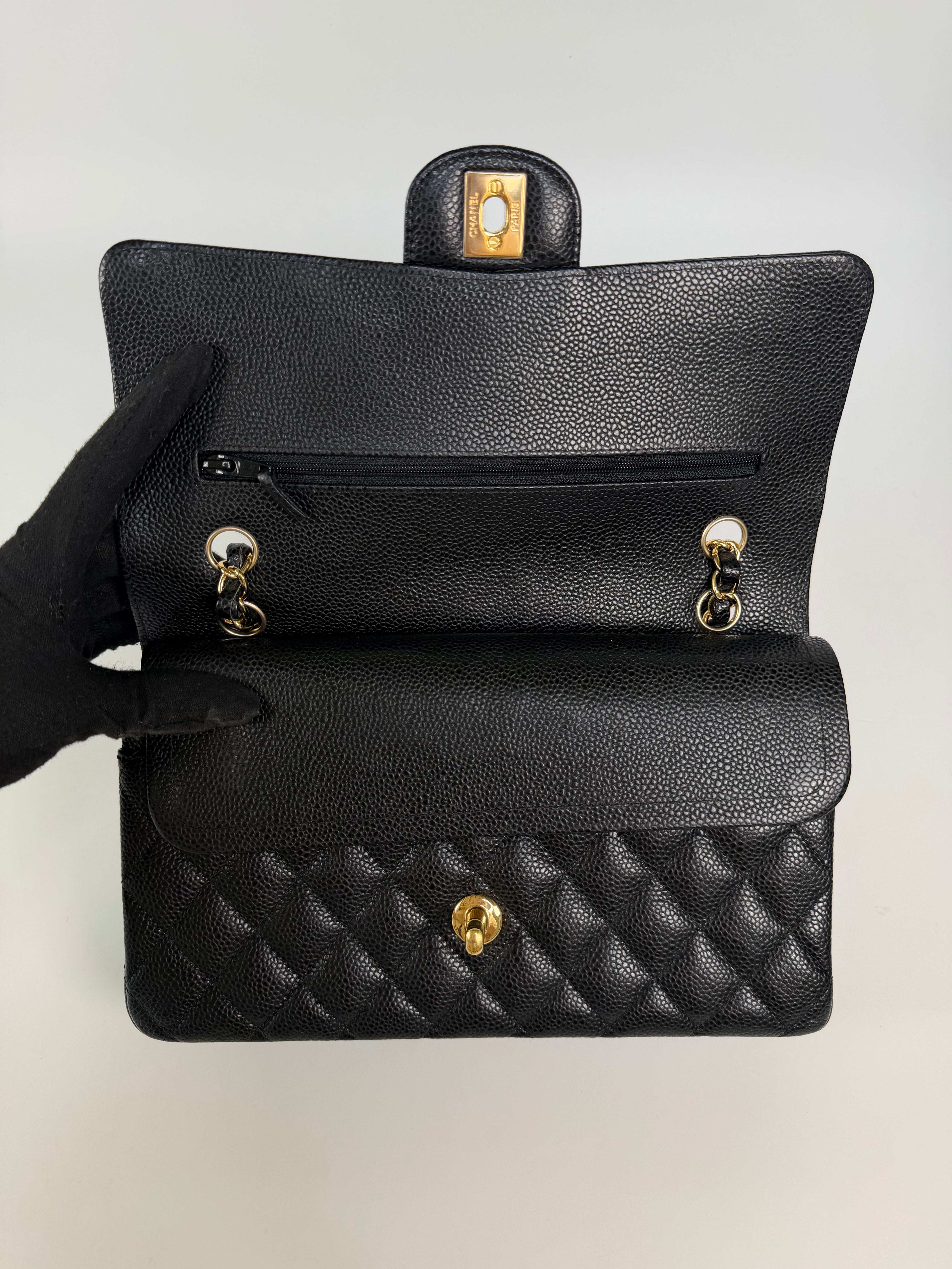 Chanel Medium Classic Double Flap Black Caviar Gold Hardware. Authentic and preloved in excellent condition.  100% guarantee