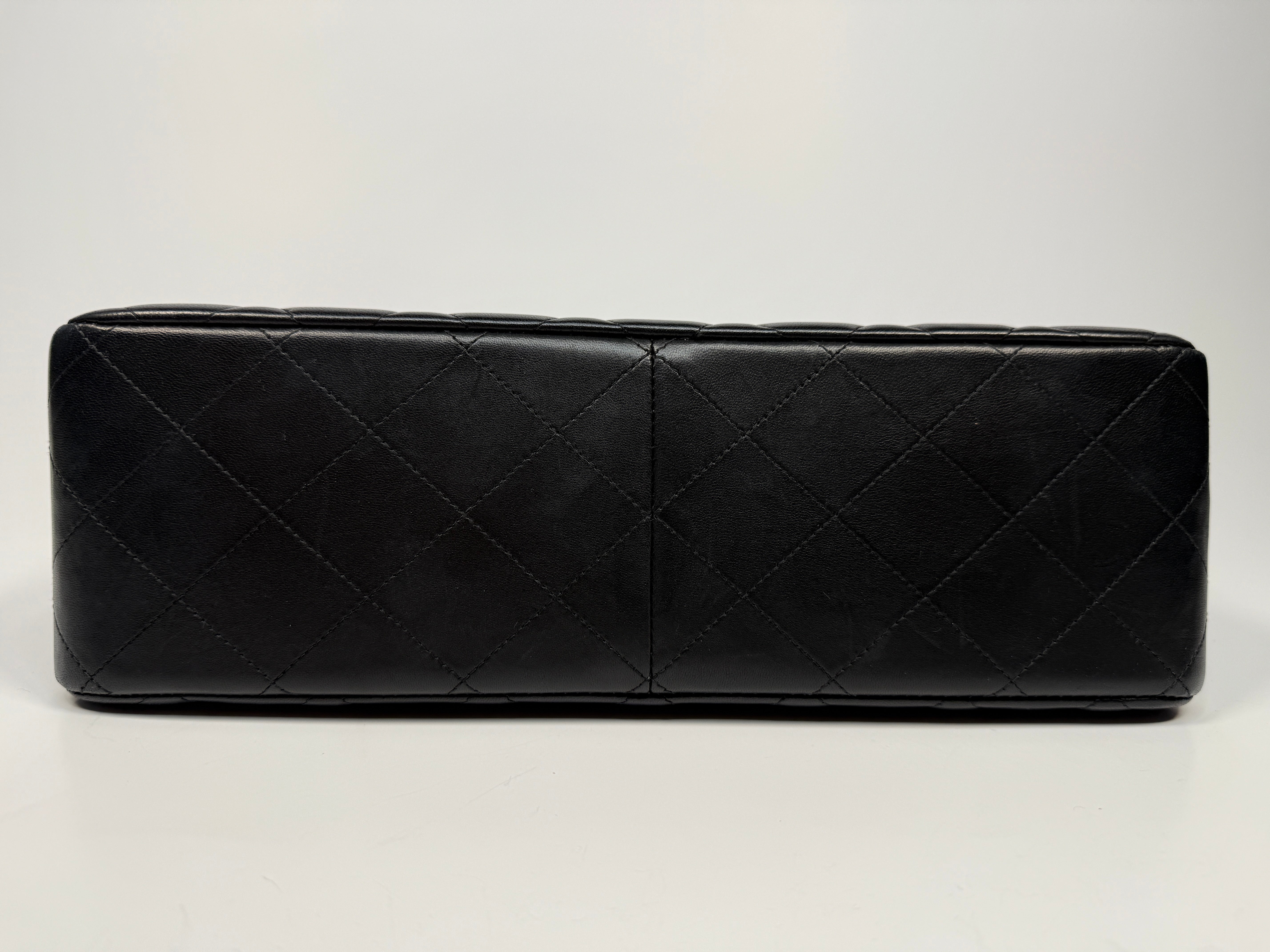 Chanel Jumbo Classic Flap Bag In Black Lambskin Leather With Gold Hardware
Pre Loved & Authentic