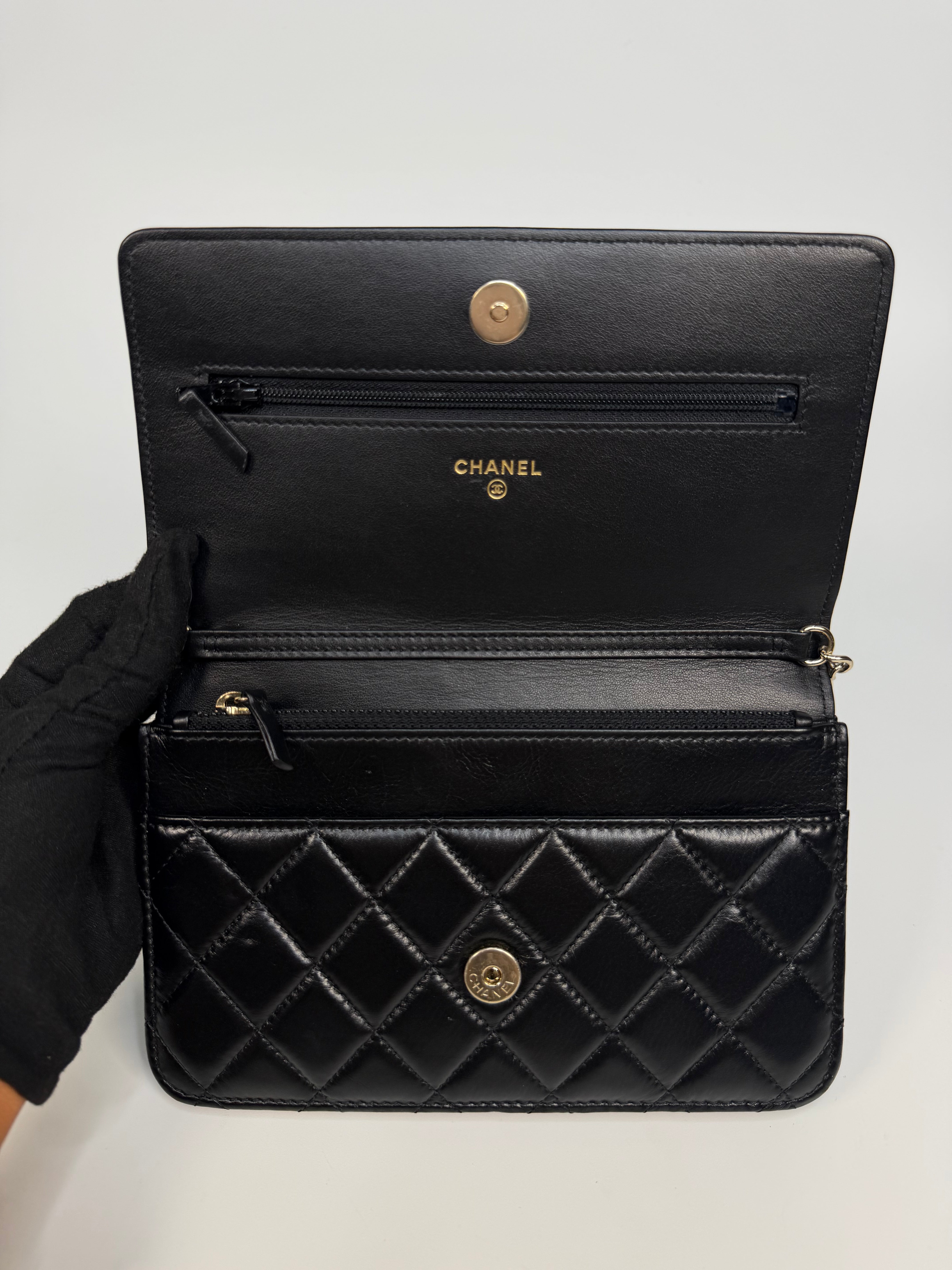 Chanel Pearl Wallet On Chain In Black Lambskin Leather With Gold Hardware. Authentic and preloved in very good condition.