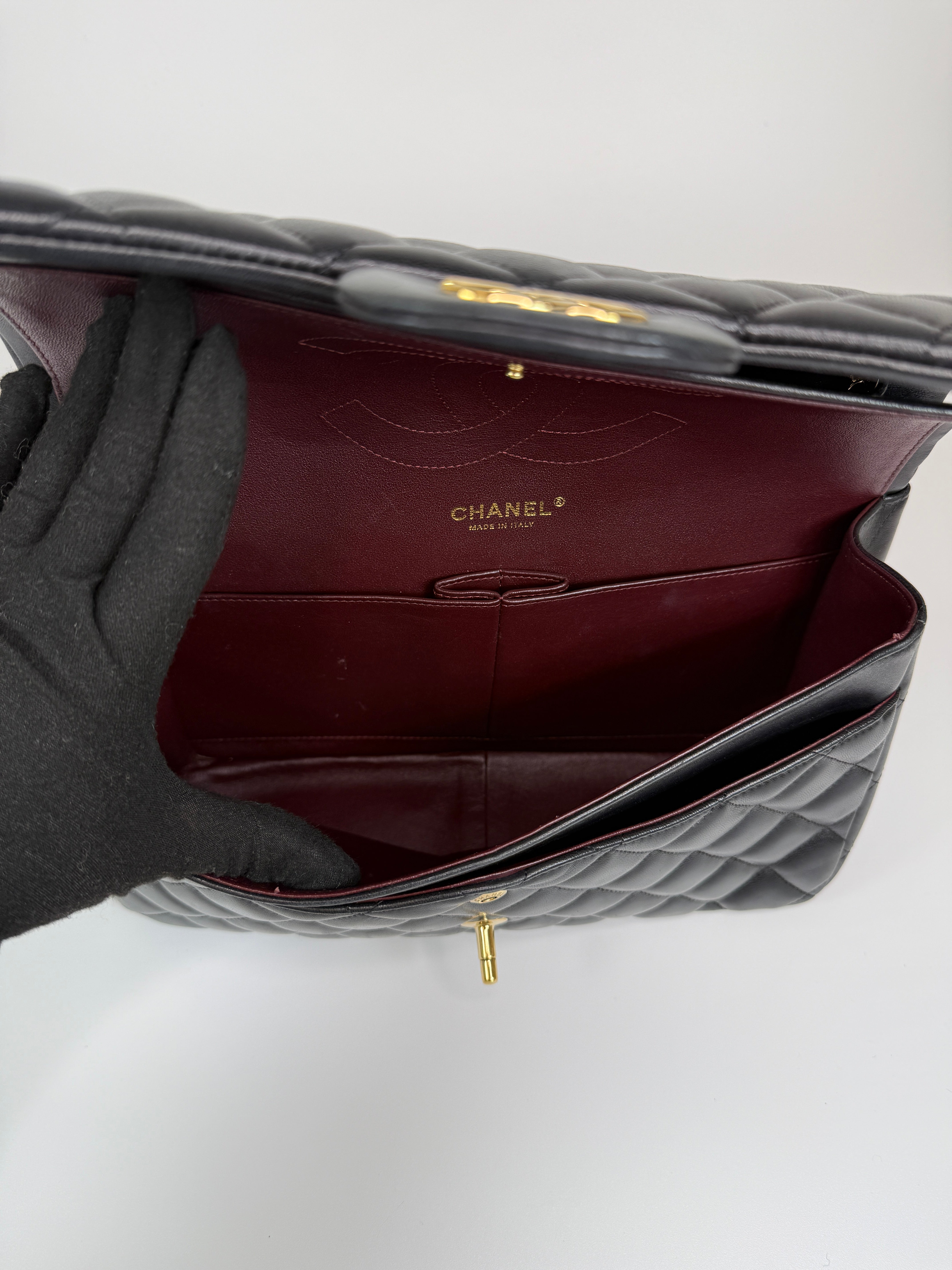 Authentic and preloved Chanel Jumbo Classic Flap Bag In Black Lambskin Leather With GOLD Hardware. Excellent condition. 100% Authenticity Guarantee 