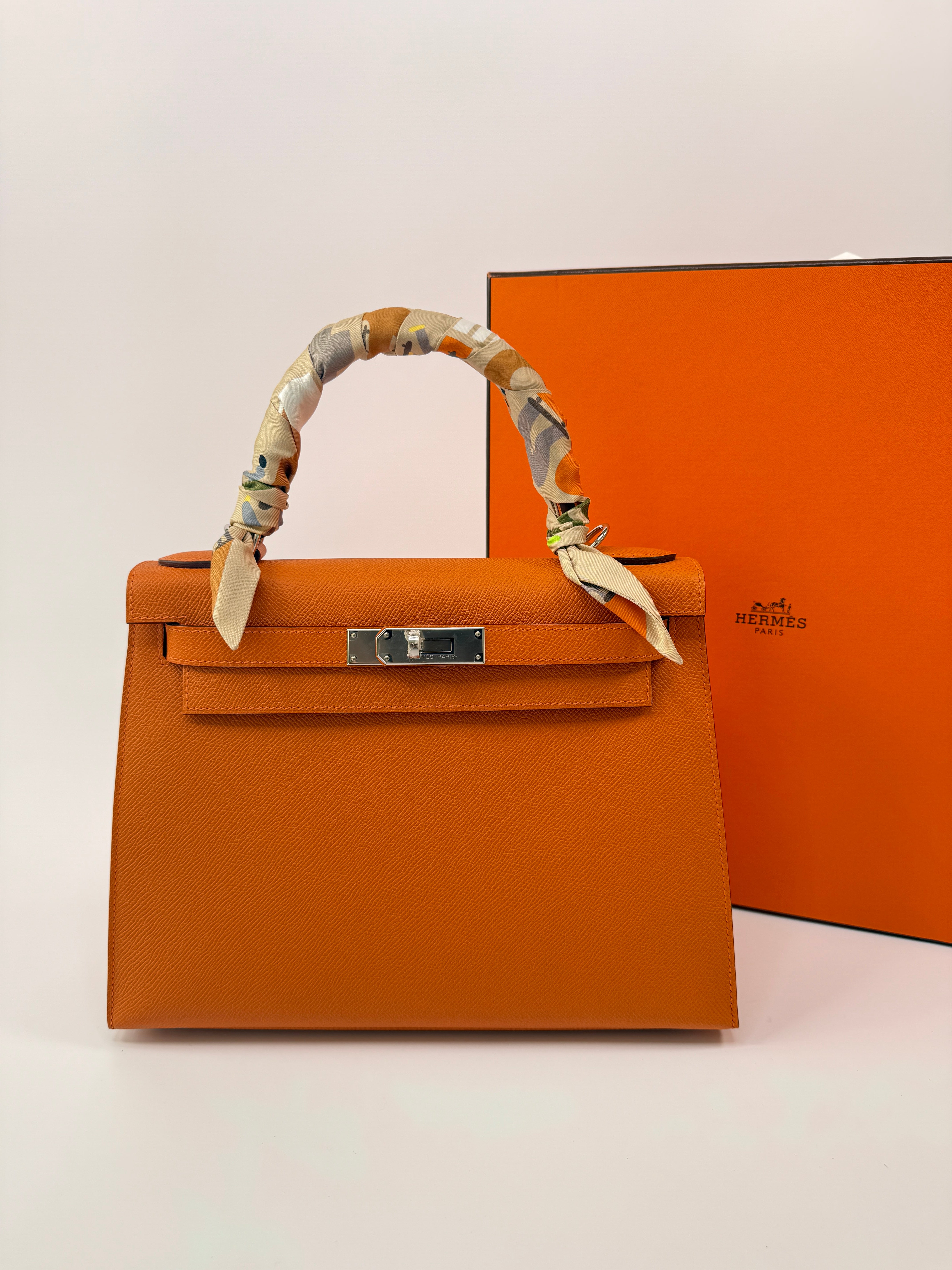 Authentic Pre Loved Hermès Kelly 28 In Orange Epsom Leather With Palladium Hardware New & Unused Condition