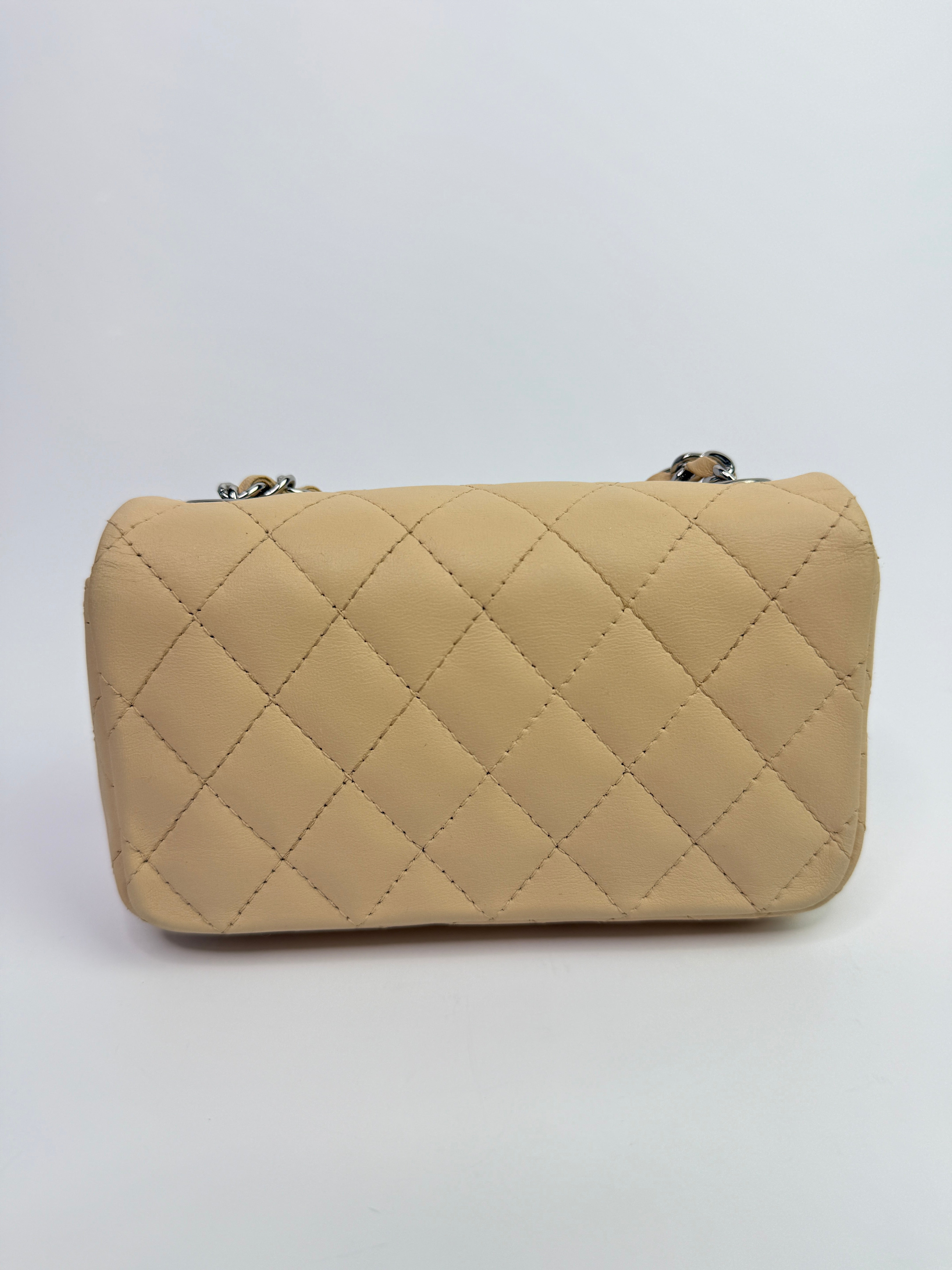 Chanel Super Mini Classic Flap Bag In Beige Lambskin With SHW