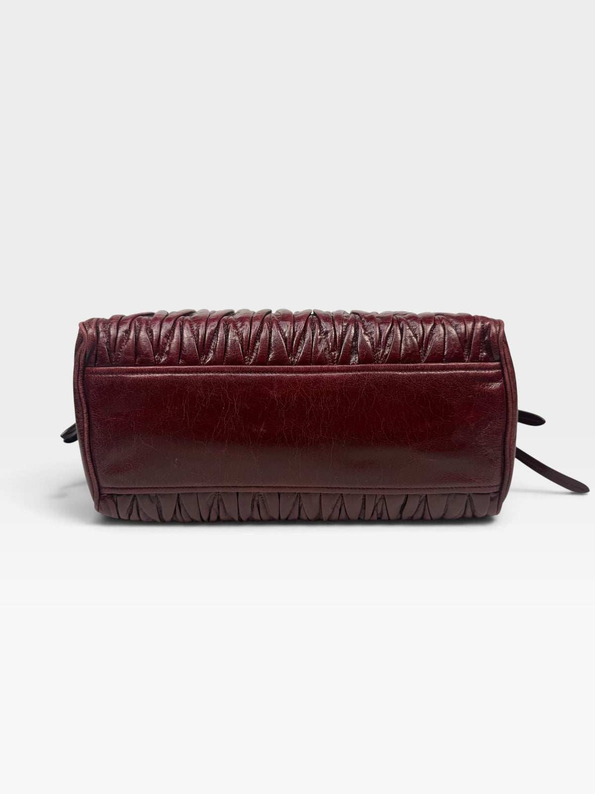 Miu Miu Bauletto Tote Bag In Burgundy Matelasse Leather With Gold Hardware. 100% authentic and pre loved in excellent condition. 