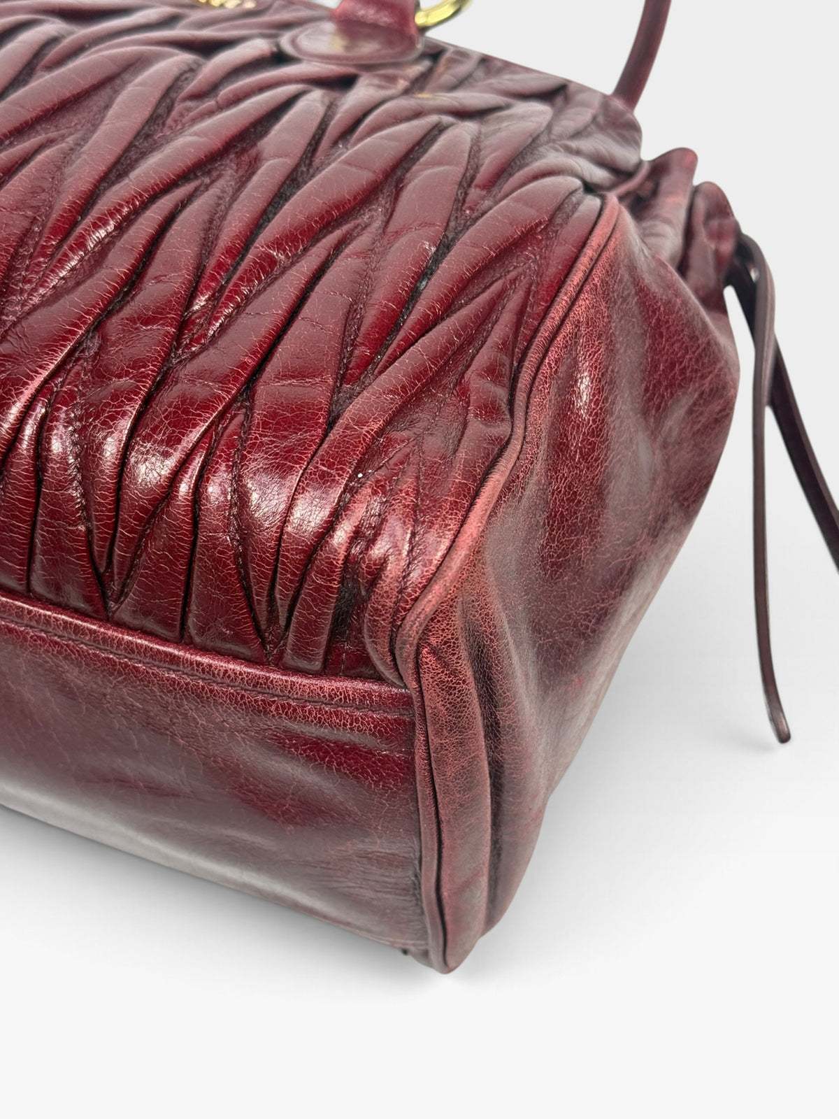 Miu Miu Bauletto Tote Bag In Burgundy Matelasse Leather With Gold Hardware. 100% authentic and pre loved in excellent condition. 