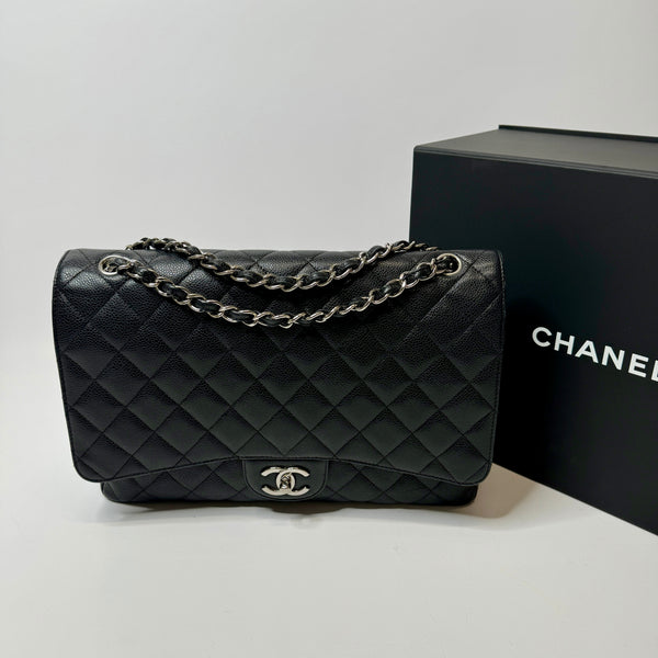 Chanel Maxi Classic Double Flap In Black Caviar Leather With Silver Hardware
