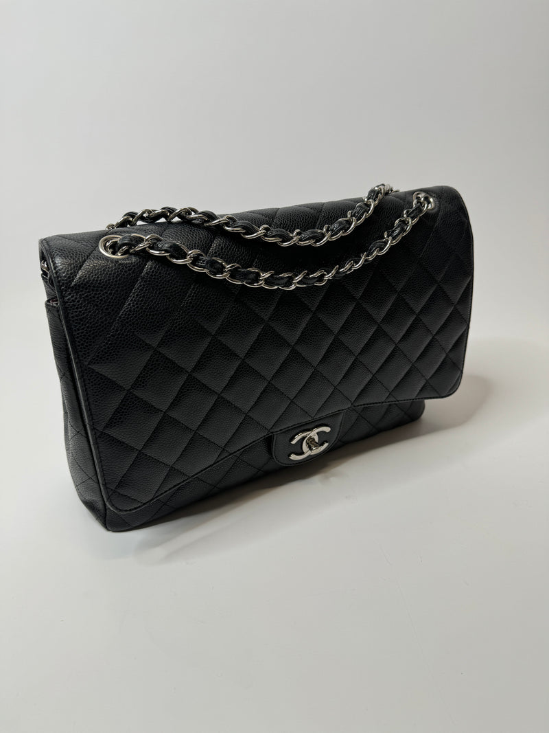 Chanel Maxi Classic Double Flap In Black Caviar Leather With Silver Hardware