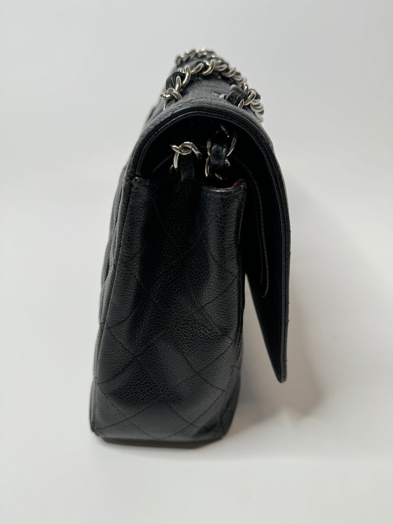 Chanel Maxi Classic Double Flap In Black Caviar Leather With Silver Hardware