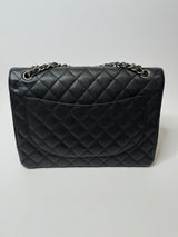 Chanel Maxi Classic Double Flap In Black Caviar Leather With Silver Hardware