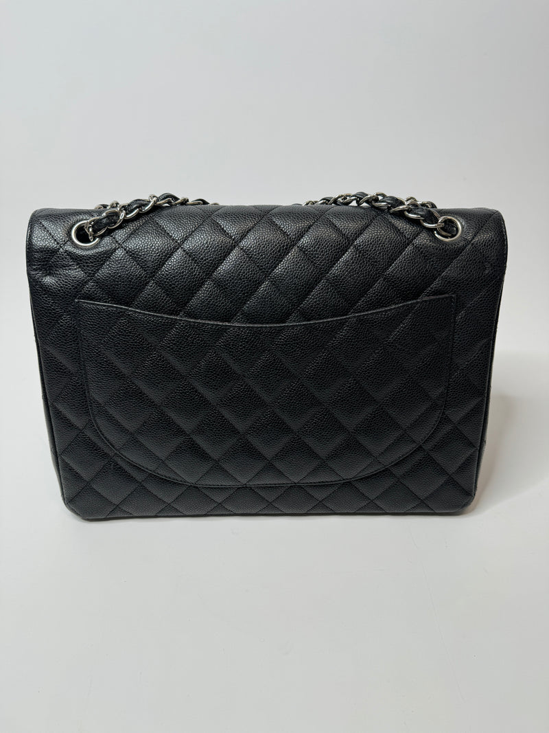 Chanel Maxi Classic Double Flap In Black Caviar Leather With Silver Hardware
