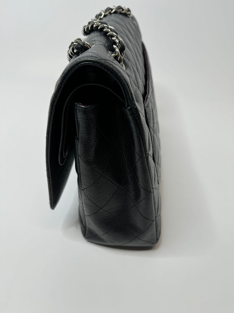 Chanel Maxi Classic Double Flap In Black Caviar Leather With Silver Hardware
