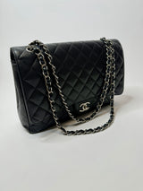 Chanel Maxi Classic Double Flap In Black Caviar Leather With Silver Hardware