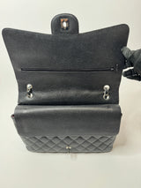 Chanel Maxi Classic Double Flap In Black Caviar Leather With Silver Hardware