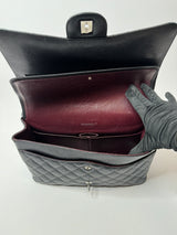 Chanel Maxi Classic Double Flap In Black Caviar Leather With Silver Hardware
