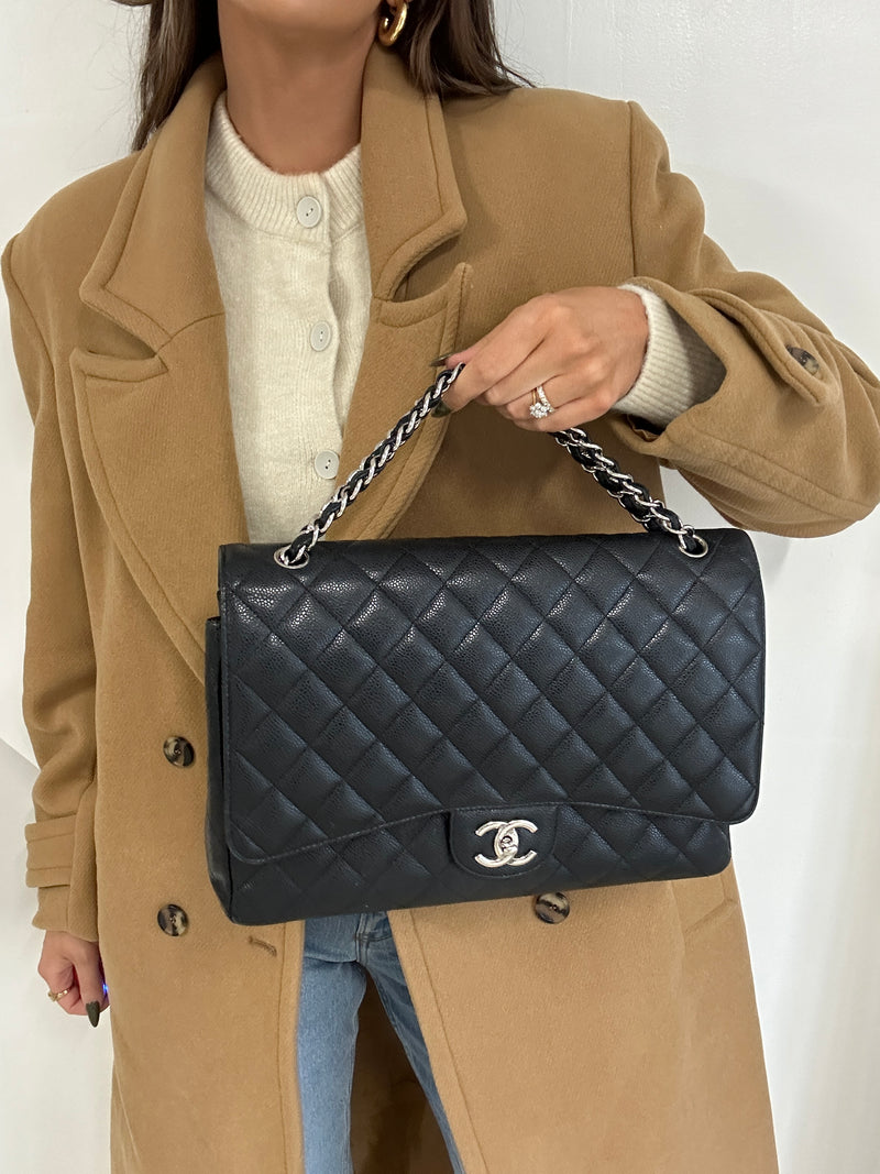 Chanel Maxi Classic Double Flap In Black Caviar Leather With Silver Hardware