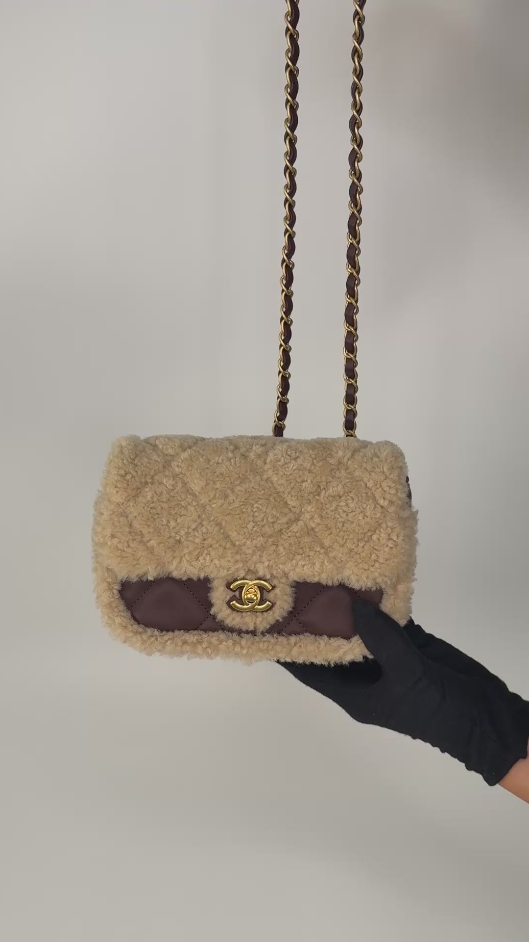 Chanel Mini Rectangle In Brown Lambskin Leather & Shearling With Gold Hardware. Authentic and preloved in excellent condition with 100% authenticity guarantee.
