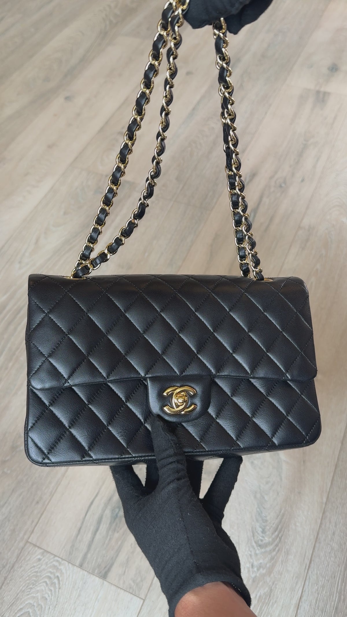 Chanel Medium Classic Double Flap In Black Lambskin Leather With Gold Hardware. 100% authentic and preloved in excellent condition