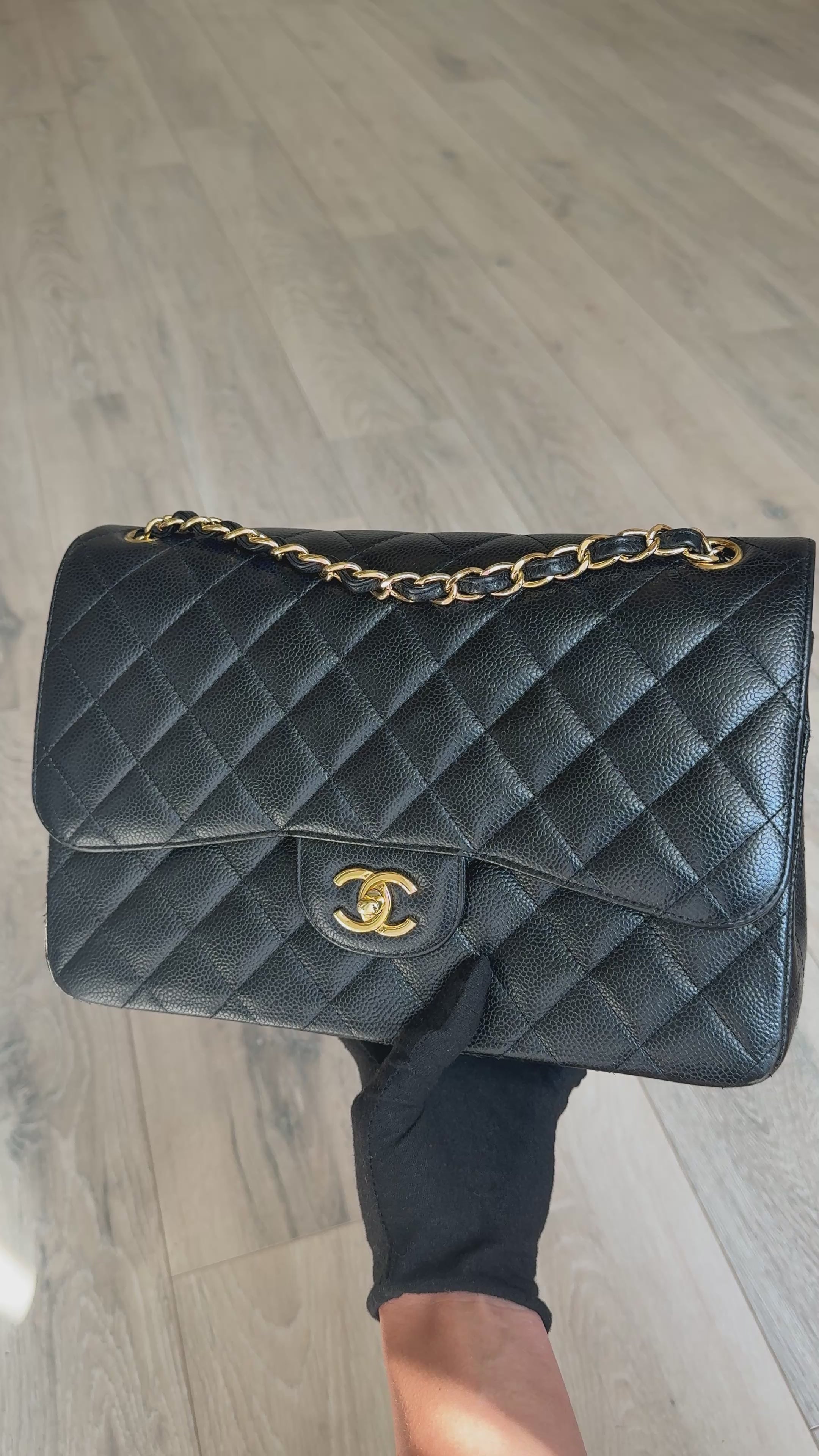 Chanel Jumbo Classic Flap Bag In Black Caviar Leather With Gold Hardware 100% authentic and preloved in excellent condition