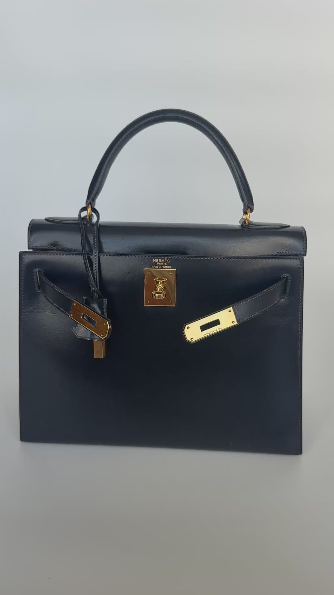 Hermès Vintage Kelly 28 In Navy Sellier Box Leather With Gold Hardware. 100% authentic and preloved in excellent condition.