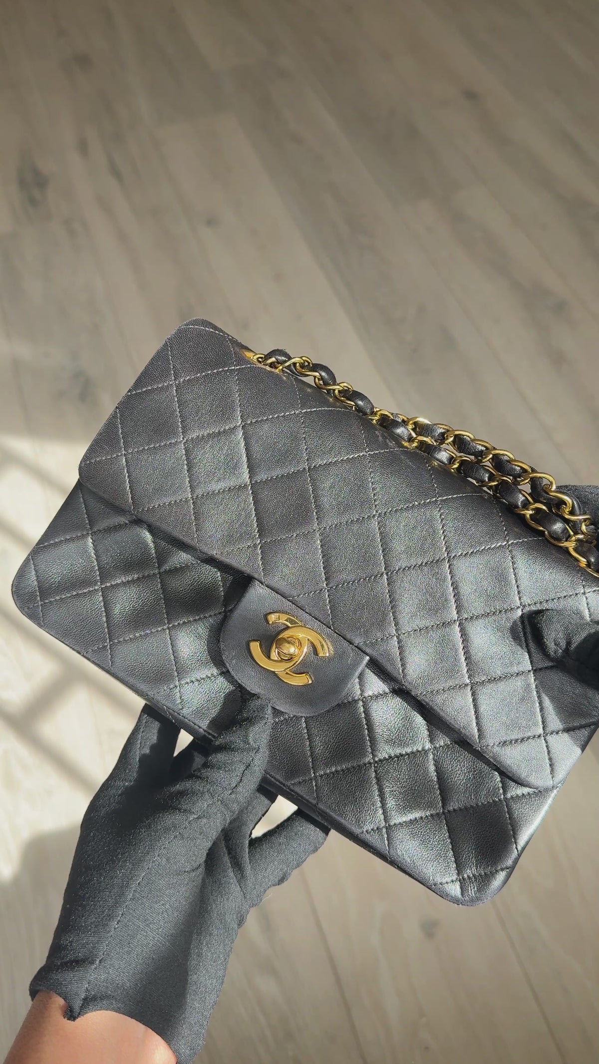 Chanel Vintage Small Classic Double Flap In Black Lambskin Leather 24Kt Hardware. Authentic and preloved in excellent condition. 100% guarantee