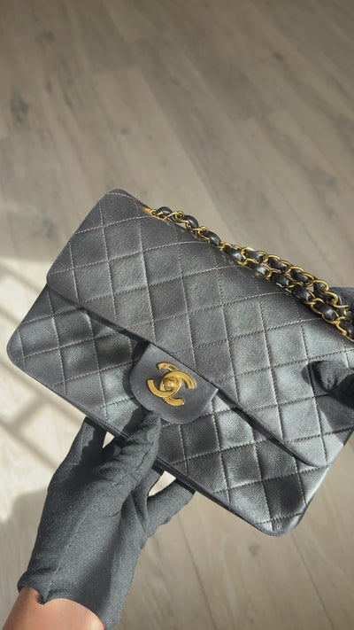 Chanel Vintage Small Classic Double Flap In Black Lambskin Leather 24Kt Hardware. Authentic and preloved in excellent condition. 100% guarantee