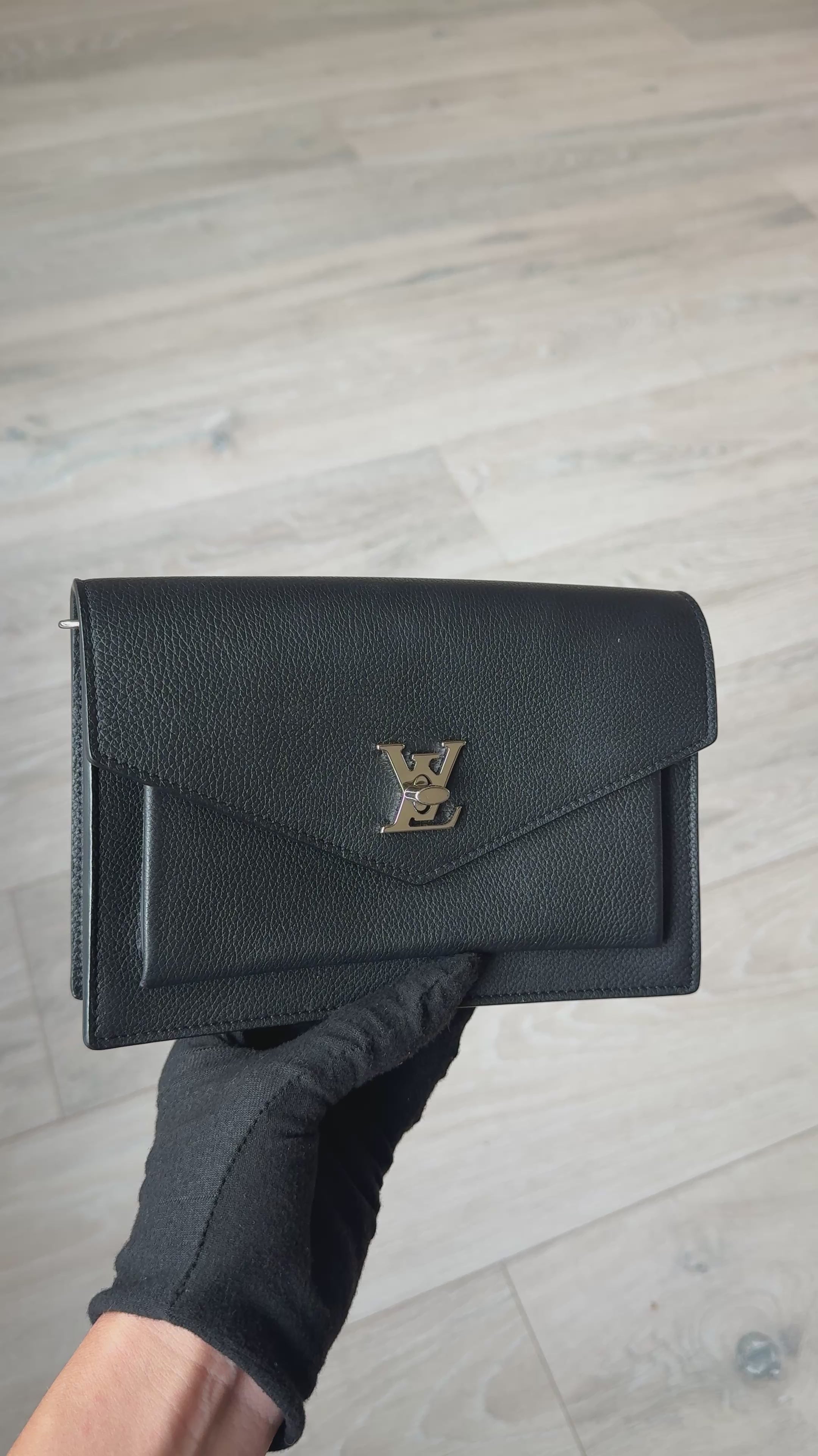 Louis Vuitton Pochette Chain MyLockMe In Black Leather With Silver Hardware in excellent condition 100% authentic and preloved 