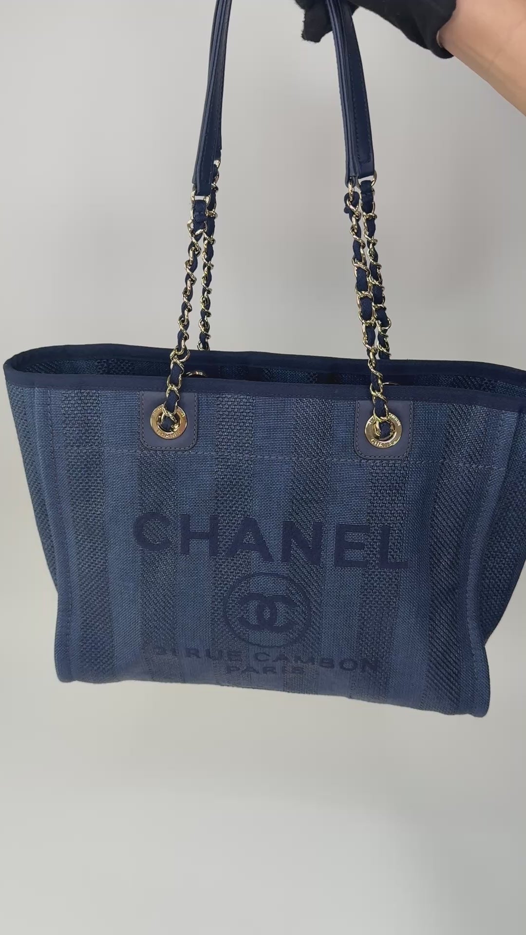 Chanel Small Deauville Tote Bag In Black With Gold Hardware. Authentic and preloved in excellent condition with 100% authenticity guarantee.