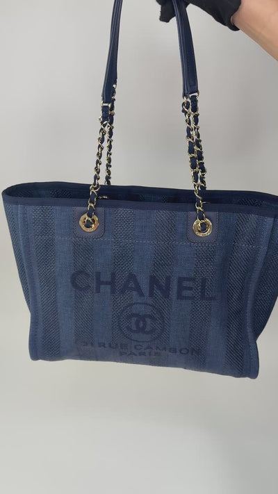 Chanel Small Deauville Tote Bag In Black With Gold Hardware. Authentic and preloved in excellent condition with 100% authenticity guarantee.