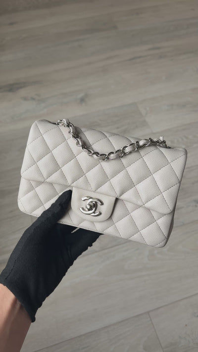 Chanel Mini Rectangle Pale Grey Caviar Leather With Silver Hardware in excellent condition 100% authentic and preloved