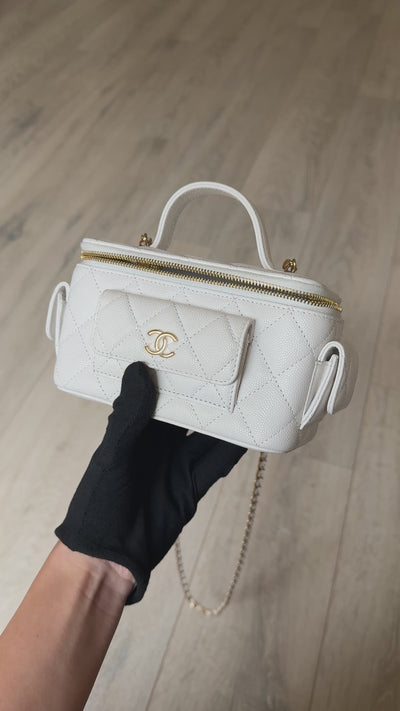 Chanel Vanity Top Handle  Multi Pockets In White Caviar Leather With Gold Hardware. 100% authentic and preloved in excellent condition