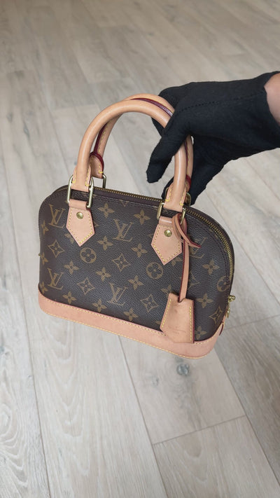 Louis Vuitton Alma BB In Brown Monogram Canvas With Gold Hardware. Authentic and preloved in very good condition