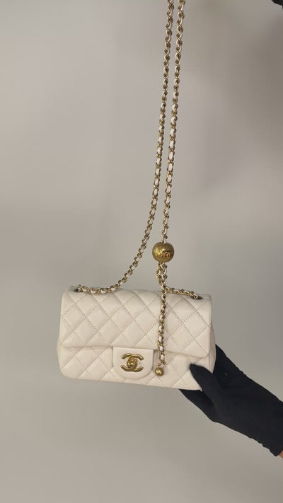 Chanel Pearl Crush Mini Rectangle In White Lambskin Leather Gold Hardware. Authentic and preloved in excellent condition with 100% authenticity guarantee.