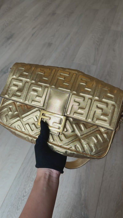 Fendi Large Baguette In Gold Leather Monogram With Gold Hardware. 100% authentic and preloved in excellent condition