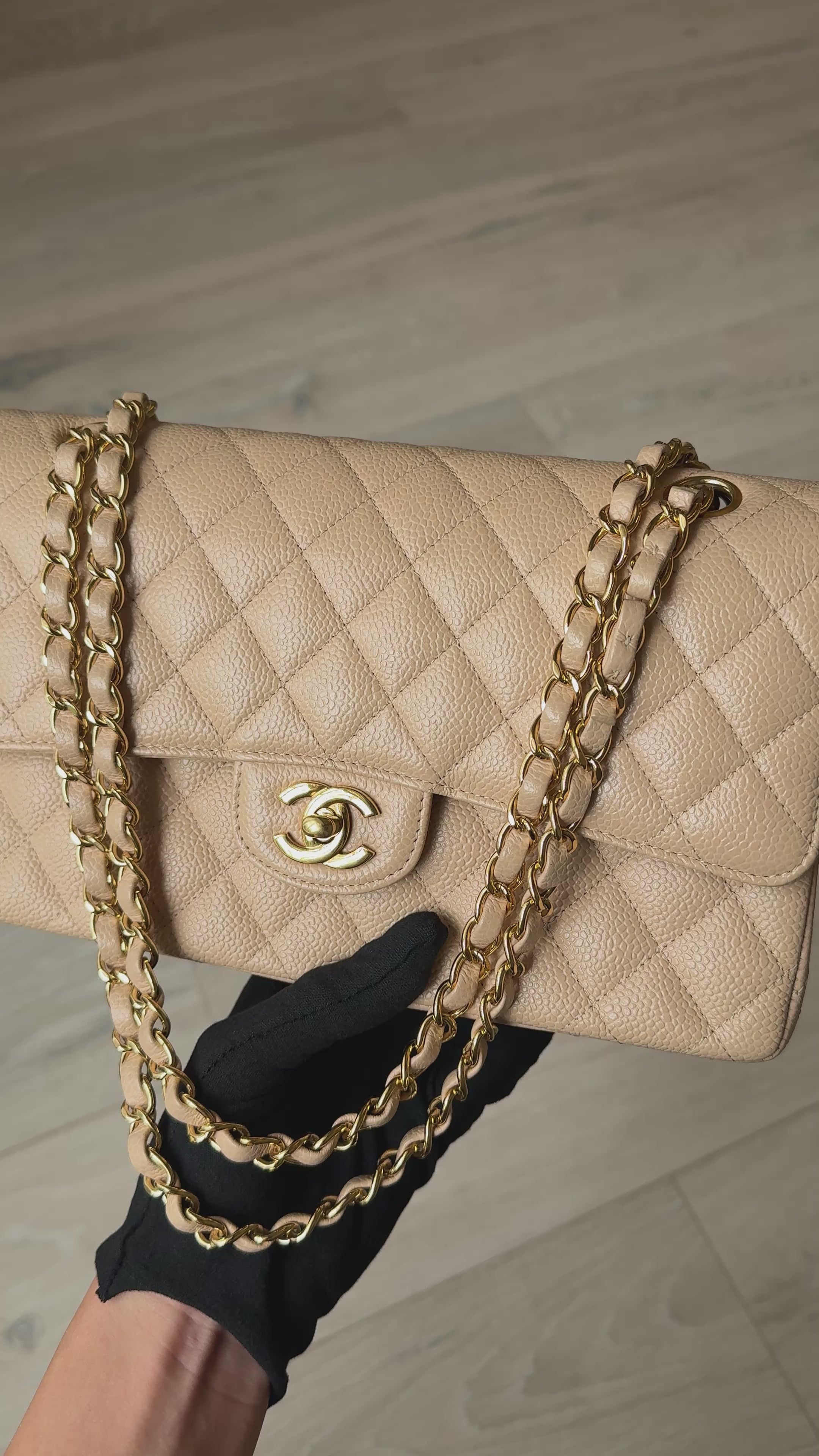 Chanel Medium Classic Flap In Beige Caviar Leather With Gold Hardware. 100% authentic and preloved in excellent condition