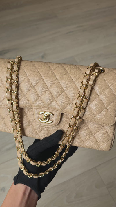 Chanel Medium Classic Flap In Beige Caviar Leather With Gold Hardware. 100% authentic and preloved in excellent condition