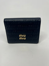 Miu Miu Embossed Monogram bi-fold Wallet