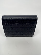 Miu Miu Embossed Monogram bi-fold Wallet